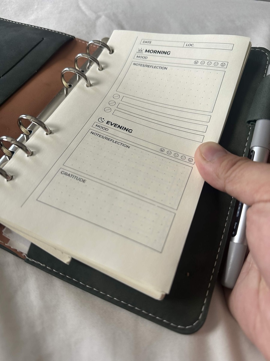 The daily page, printed and bound in a ring binder